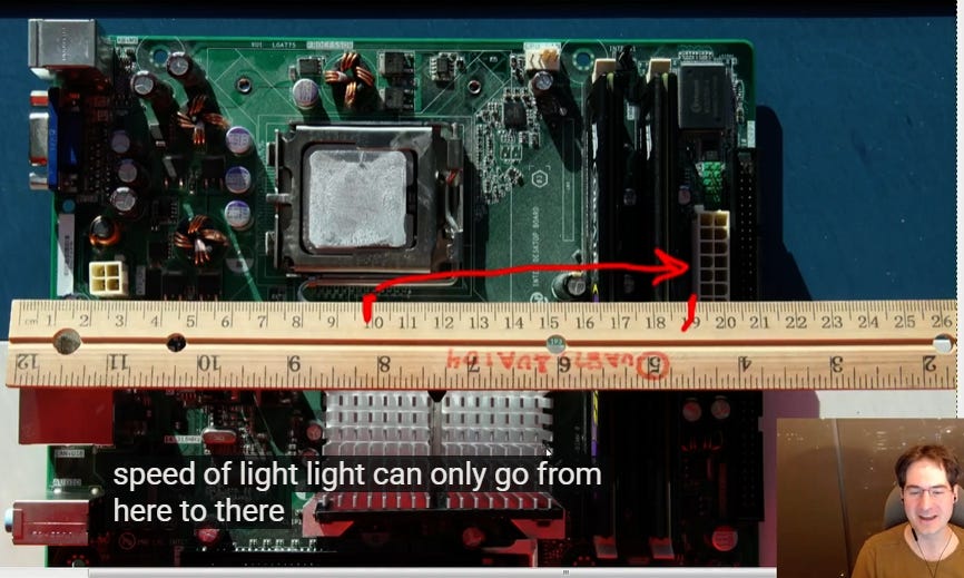 Happy Casey measuring the distance between the CPU and Motherboard